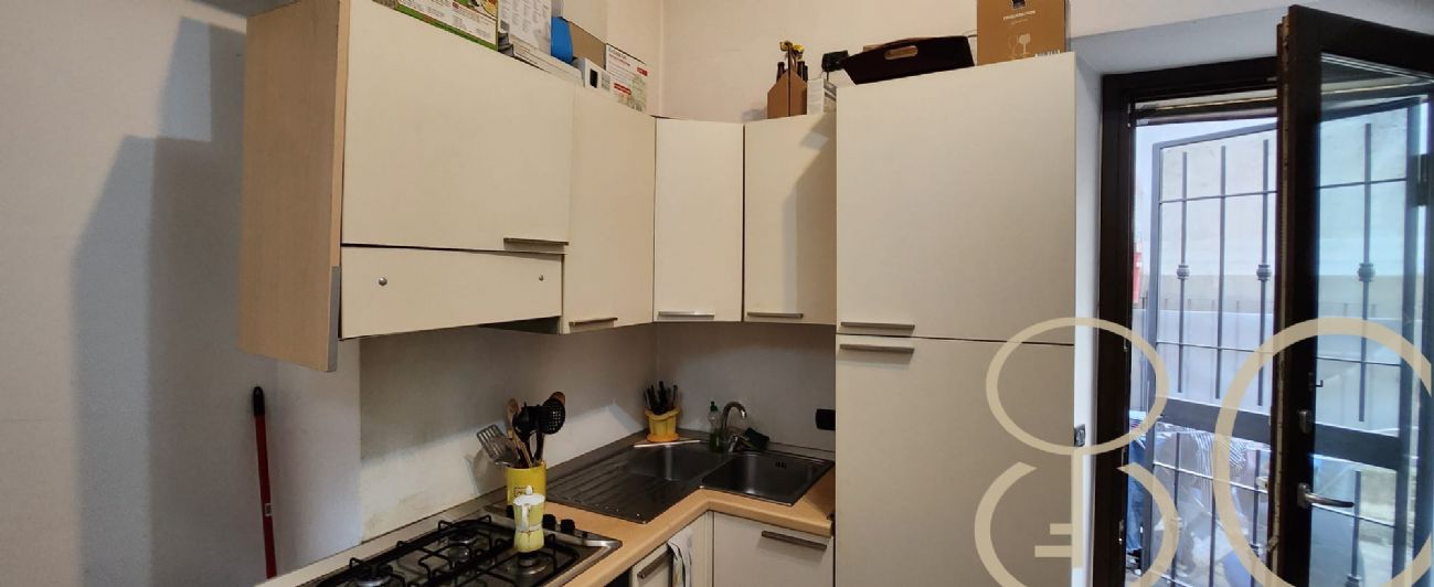 BILOCALE CON CORTILE PRIVATO E TAVERNA