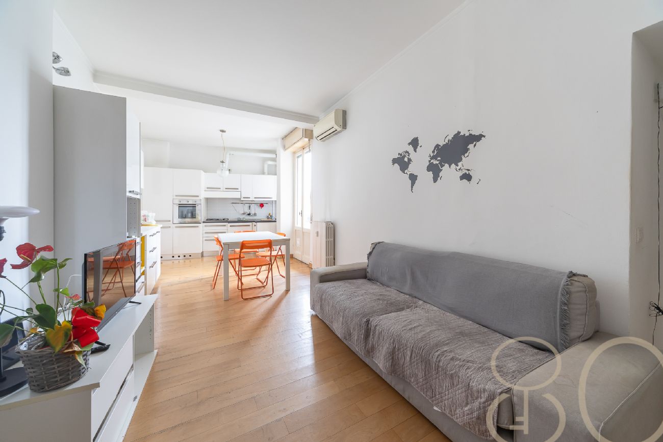 TRILOCALE PIANO ALTO CON DOPPIO BALCONE